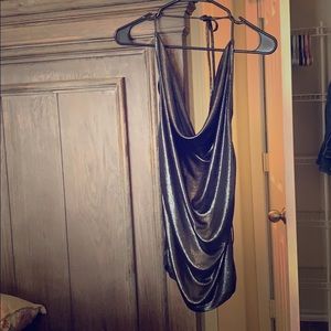 Halter top. Brand new. Shimmering silver